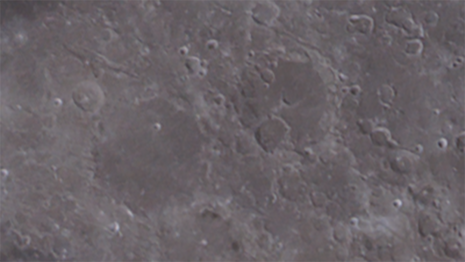 The sharpened version of the stacked image. It is sharper than the stacked image, while still having minimal noise.