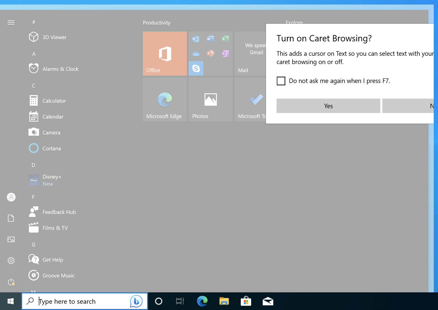 A wider start menu, with a partly visible caret browsing dialogue box on top.